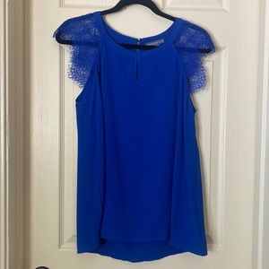 Cute blue blouse with lace cap sleeves